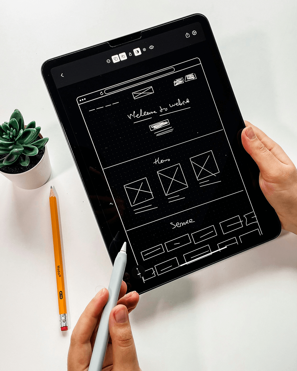 Planering av designelement, hemsida och visuell identitet